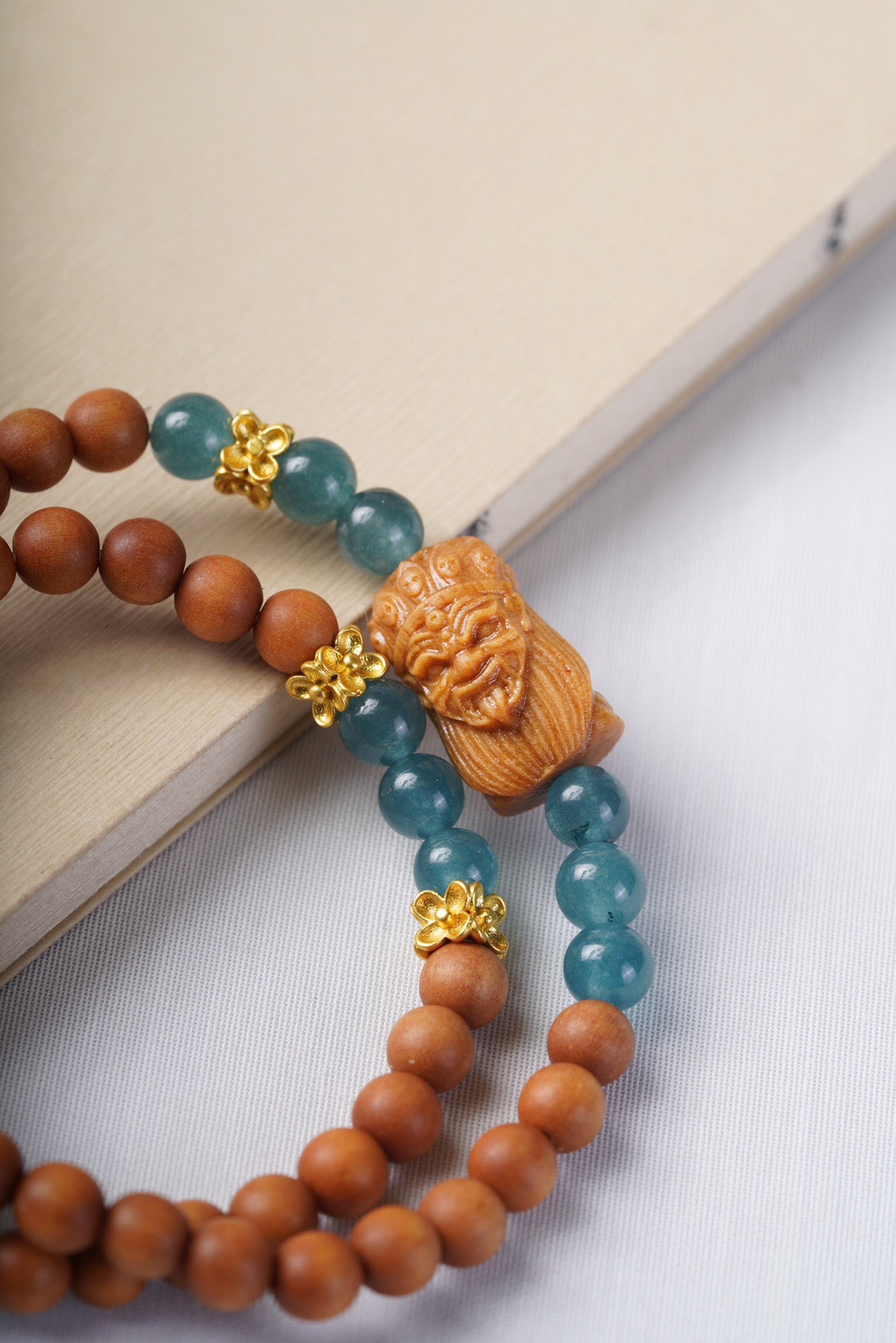 Barbie Sandalwood with Natural Blue Aquamarine and Tsakli Ram Double Loop Bracelet