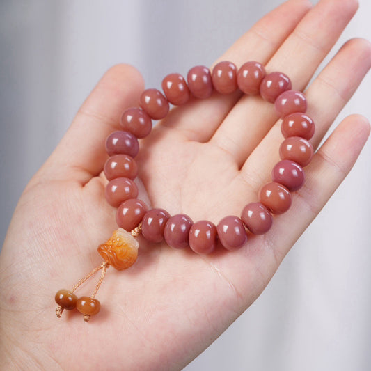 Smoky Pink Bodhi Bead Bracelet with Roaring Lion Pendant