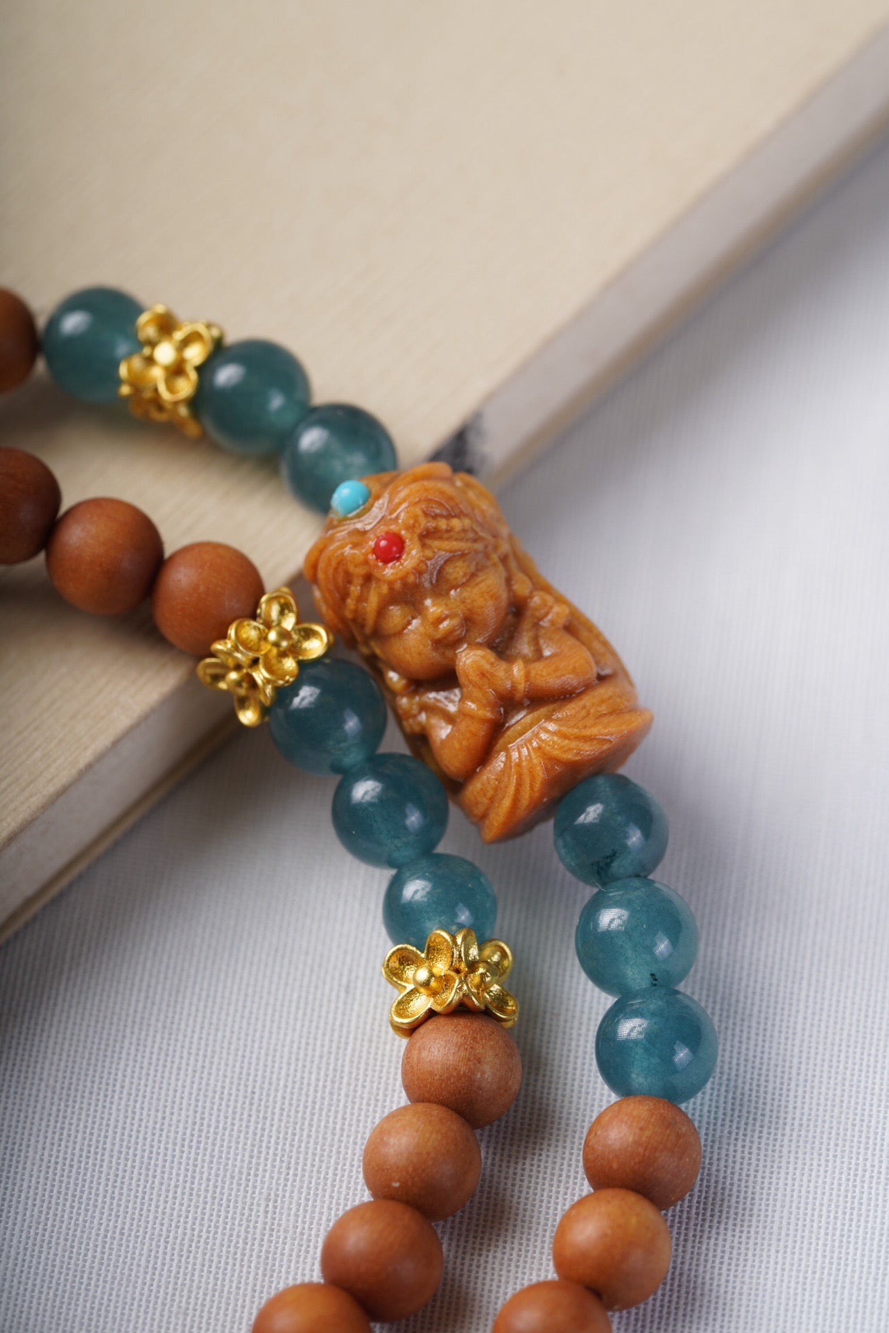 Barbie Sandalwood with Natural Blue Aquamarine and Tsakli Ram Double Loop Bracelet