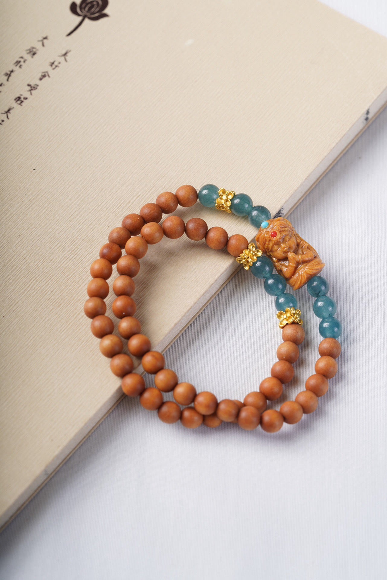 Barbie Sandalwood with Natural Blue Aquamarine and Tsakli Ram Double Loop Bracelet