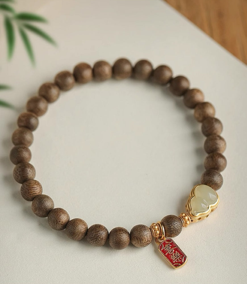 Agarwood and Hetian Jade Gourd Bracelet