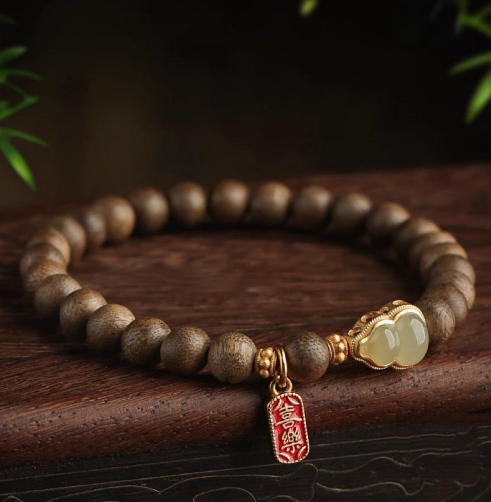 Agarwood and Hetian Jade Gourd Bracelet